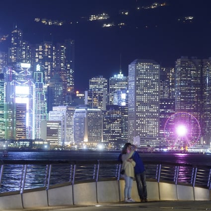 Hong Kong’s Victoria Harbour lights up at night. Photo: Sam Tsang