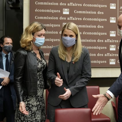 Facebook whistleblower Frances Haugen, centre, arrives for a hearing with lawmakers in Paris on November 10. She has warned that the "metaverse," the virtual reality world at the heart of the social media giant's growth strategy, will be addictive and rob people of more personal information. Photo: AP