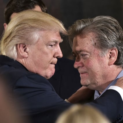 Then US President Donald Trump (left) congratulates Steve Bannon during the swearing-in of senior staff at the White House in January 2017. Photo: AFP