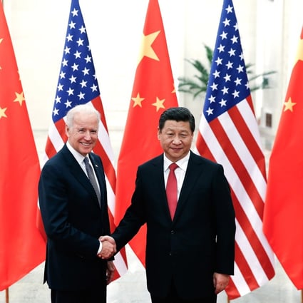 Xi Jinping and Joe Biden pictured in Beijing in 2013. Photo: Getty Images/TNS