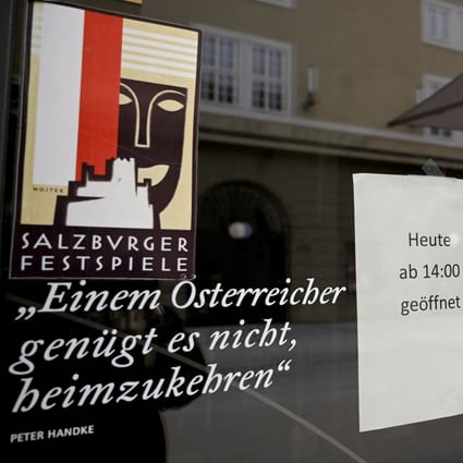 A sign for customers to be either vaccinated or recovered from Covid-19 in Salzburg, Austria, on November 12. Parts of the country are introducing a lockdown for the unvaccinated from Monday. A nationwide lockdown for those who have not had a jab may follow. Photo: AFP