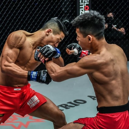 China's Tang Kai (right) punches South Korea's Yoon Chang Min at the ONE: NextGen: II event in Singapore. Photo: ONE Championship