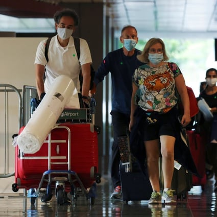 Passengers arrive at Changi Airport. File photo: Reuters