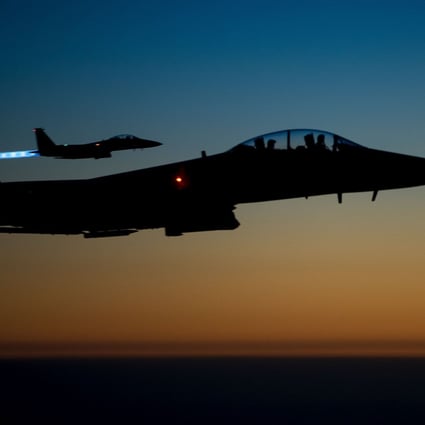 A pair of US Air Force F-15E Strike Eagles fly over northern Iraq in September 2014 after conducting air strikes in Syria. Photo: US Air Forces Central Command via AFP