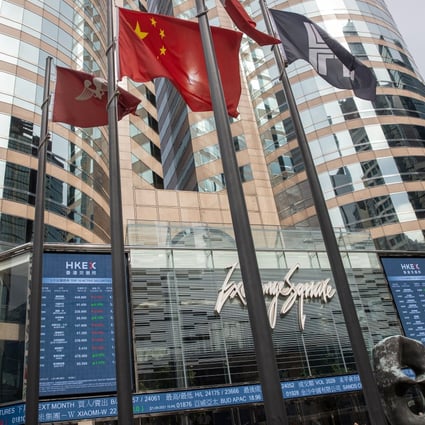 Electronic billboards display stock transactions on Exchange Square, the location of the Hong Kong stock exchange, on September 21. Photo: EPA-EFE