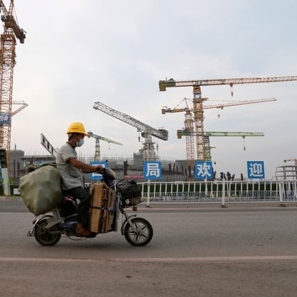 A China Evergrande Group construction site in Guangzhou. Opportunities in China might continue to grow, as default rates for Chinese high-yield bonds and the debts of its real estate sector were expected to top 13 per cent and 20 per cent, respectively, in 2021, Oaktree said in an insights publication this month. Photo: Reuters