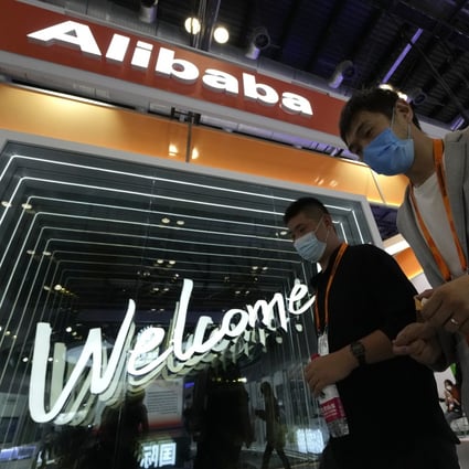 Visitors pass by the Alibaba booth during the China International Fair for Trade in Services in Beijing, Sept. 7, 2021. Photo: AP