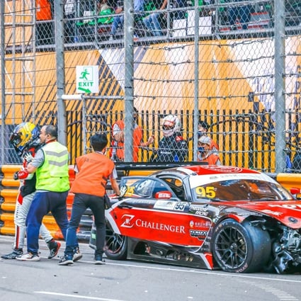 Hong Kong driver Darryl O'Young is taken to the medical centre after he crashes at the Macau Grand Prix GT Cup round one event. Photo: Macau Grand Prix