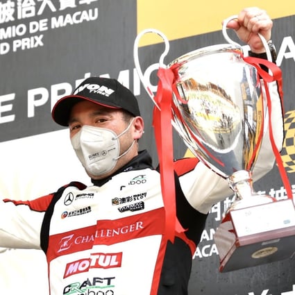 Hong Kong driver Darryl O'Young on top of the podium after winning the Macau Grand Prix GT Cup. Photo: Craft Bamboo Racing
