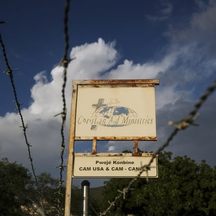 A sign outside Christian Aid Ministries in Titanyen, Haiti. Photo: AP
