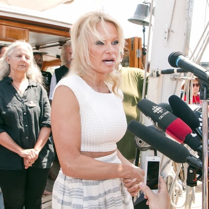 Actress Pamela Anderson appeared at this week's press conference with biologist Alexandra Morton. Photo: Chung Chow