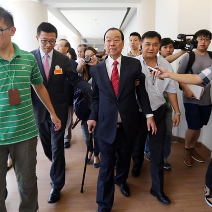 Former Heung Yee Kuk Chairman Lau Wong-fat (centre) attending a reception in June. Photo: Sam Tsang