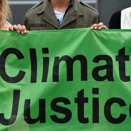Members of Friends of the Earth demonstrate at the UN summit. Photo: AFP