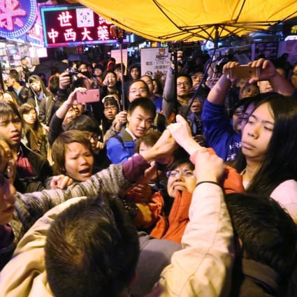 Activists clash over the weekend at a gathering held in Mong Kok to oppose the copyright bill. Photo: Edward Wong