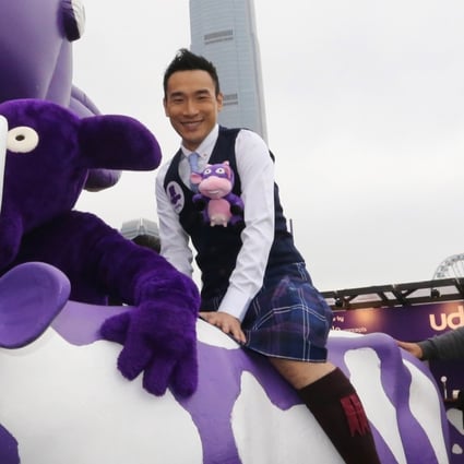 Tyson Chak aboard one of the purple cows at the Udderbelly Festival entrance in Central. Photos: Felix Wong