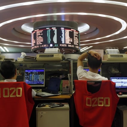 The trading floor of the Hong Kong stock exchange as business wound up by noon in a shortened session before the Christmas holiday. The market will be shut for Christmas and reopen on Monday. Photo: Reuters