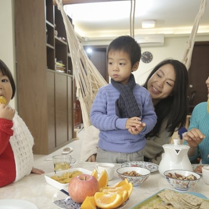 Lifestyle educator Teressa Siu (right) helped Jessica Lam Hill Young lead a healthier lifestyle. Lam hopes to influence her two children, daughter Tara Fok and son Fok Lap-hang. Photo: Paul Yeung