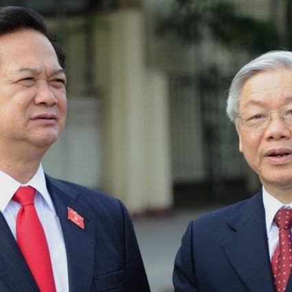 Vietnamese Prime Minister Nguyen Tan Dung (L) and National Assembly Chairman Nguyen Phu Trong (R) (Photo: AFP)