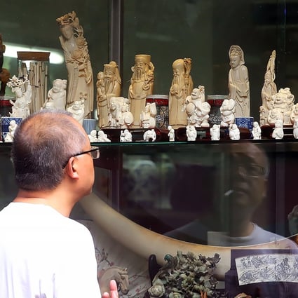 Ivory carvings and crafts are displayed in a shop on Hollywood Road. The operator’s future is now in doubt. Photo: SCMP Pictures