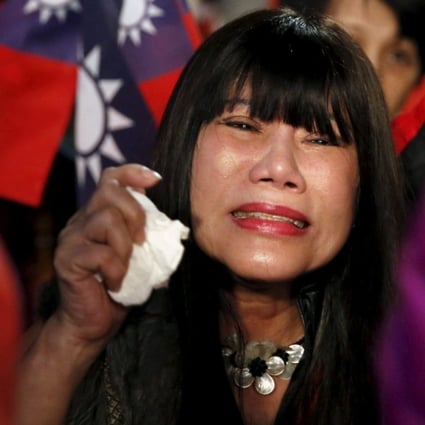 Raw emotion was on display among the Kuomintang Party supporters as they lost the Taiwan election. Photo: Reuters
