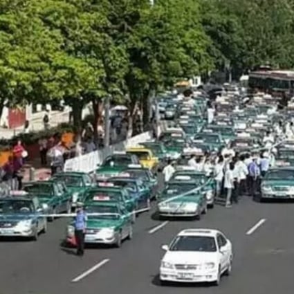 Photos uploaded on Chinese microblogging site Weibo show a ‘go-slow’ campaign in Guangzhou last July as cabbies protested how car-hailing apps were encroaching on their business. Photo: SCMP Pictures