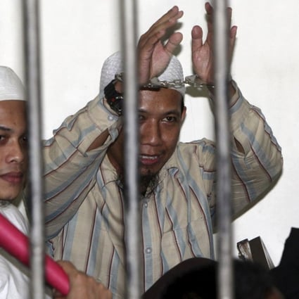 Radical Muslim cleric Aman Abdurrahman (centre). Photo: Reuters