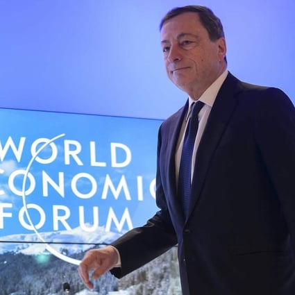 European Central Bank president Mario Draghi arrives at a World Economic Forum session in Davos, Switzerland, on Friday. Photo: AFP