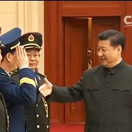 Central Military Commission chairman Xi Jinping greets senior officers from the PLA Navy, Army and Air Force. Photo: CCTV News