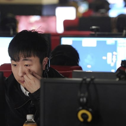 A man uses a computer at an internet cafe in Hefei, Anhui province. If only to err on the side of caution, technology should be controlled just like any other terms of our social contract. Photo: Reuters