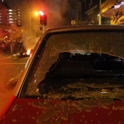 A taxi’s smashed windscreen during the Mong Kok riot at the start of the Lunar New Year holiday. Photo: Edward Wong