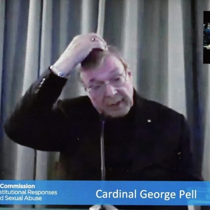 Cardinal George Pell is shown on a video screen in Canberra, Australia, on Monday as he gives evidence to the Royal Comission into Institutional Responses to Child Sexual Abuse via video link from Rome, Italy. Photo: EPA