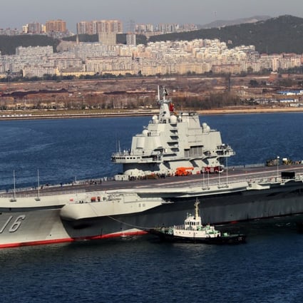 The Liaoning, China's first aircraft carrier, returns to port after its first navy sea trial in Dalian in northeastern China's Liaoning province in 2012. Photo: AP