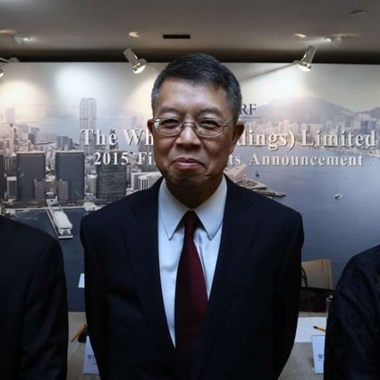 Wharf Chairman Stephen Ng Tin-hoi (centre), Vice Chairman Doreen Lee Yuk-fong (right) and Financial Controller Kevin Hui Chung-ying at the results briefing on Wednesday. Photo Jonathan Wong