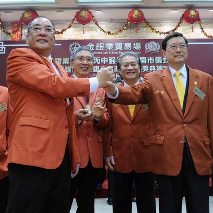 Chinese Gold and Silver Exchange Society officials at a ceremony on the first trading day of the Year of the Monkey. Photo: SCMP Picture