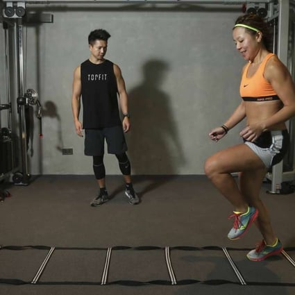 With the first phase of strength training successfully wrapped up, trainer Arnold Wong will now take Janice Lee through functional training, such as the agility ladder, to train the body to move as fast as possible. Photos (unless indicated): KY Cheng