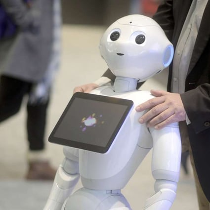Humanoid robot ‘Pepper’ is seen during the CeBIT trade fair in Germany in March. Analysts say home-caring robots have great market potential in China. Photo: Reuters