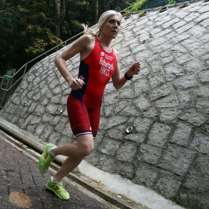 Triathlete Kate Rutherford, a mother of two who will represent Hong Kong for the first time at the age of 43, on a training run at Bowen Road Park on Bowen Road. Photo: SCMP Pictures/Jonathan Wong