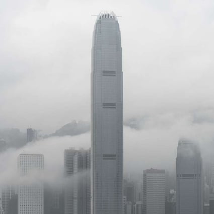 Hong Kong skyline shrouded in fog. Photo: AFP