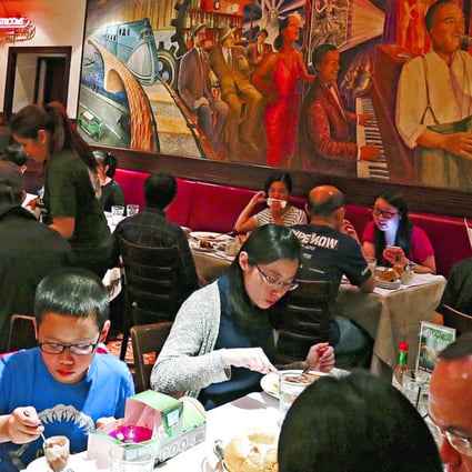 Diners enjoy their last night at Dan Ryan’s restaurant in Pacific Place. Photo: Jonathan Wong