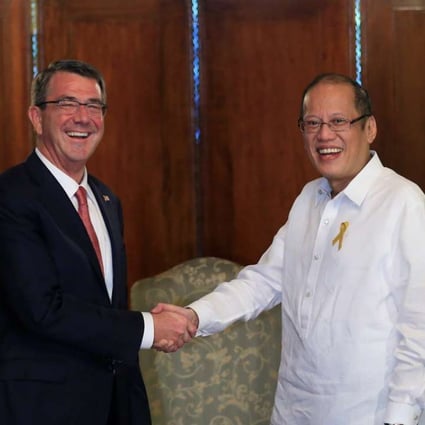 President of the Philippines Benigno Aquino (right) greets visiting US Defence Secretary Ash Carter at the presidential palace in Manila on April 14, 2016. Photo: Reuters