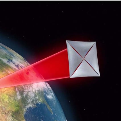 A grab from a computer-animated video provided by the Breakthrough Initiatives, the group behind the attempt to reach Alpha Centauri, shows laser beams hitting an ultra-light spacecraft over the earth. Photo: EPA