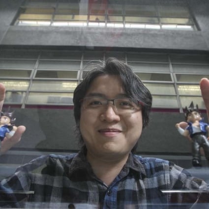 Game designer Marti Wong Kwok-hung with Little Fighter 2 dolls. Photo: Bruce Yan