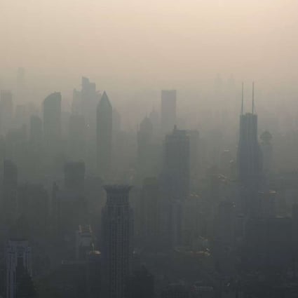Shanghai’s skyline is barely visible on a badly polluted day last month. Photo: AFP