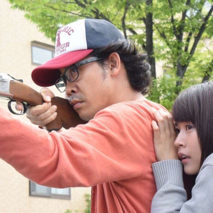 Yo Oizumi (left) and Katsumi Arimura run away from a virus-plagued city in I Am a Hero (category III; Japanese), directed by Shinsuke Sato.