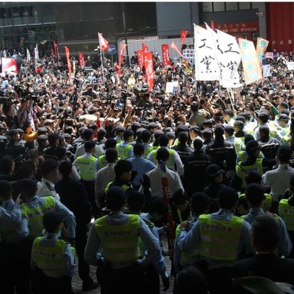 Police have held the line against protesters in Hong Kong in the past, here seen outside Hong Kong Convention and Exhibition Centre in Wan Chai where the Chief Executive election was held in 2012. Photo: SCMP Pictures