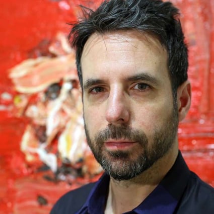British artist Antony Micallef in front of one of his works at Pearl Lam Galleries. Photo: Edmond So