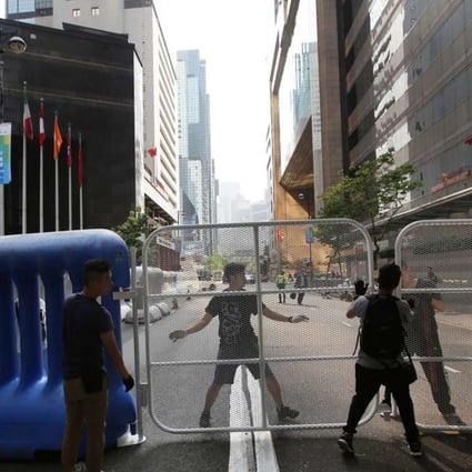 Mills barriers and water barriers have been places around the neighbourhood of the Grand Hyatt Hotel and the Convention and Exhibition Centre to cordon off restricted zones, for the National People’s Congress Standing Committee chairman’s three-day visit. Photo: Sam Tsang
