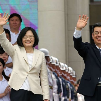 Taiwan’s new President Tsai Ing-wen (left) and Vice-President Chen Chien-jen wave during Tsai’s inauguration ceremony in Taipei, Taiwan, on Friday. Photo: Felix Wong