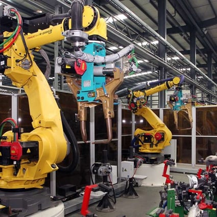 Industrial robots at work in Kunshan Daya Auto Parts Company. Photo: SCMP Pictures