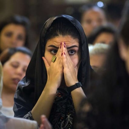 Coptic Christians attend prayers for the victims of EgyptAir flight 804 at Al-Boutrossiya Church, in the main Coptic Cathedral complex in Cairo, Egypt, on Sunday. Photo: AP